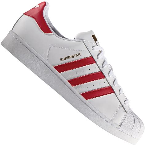 Weiße, rote adidas Superstar 